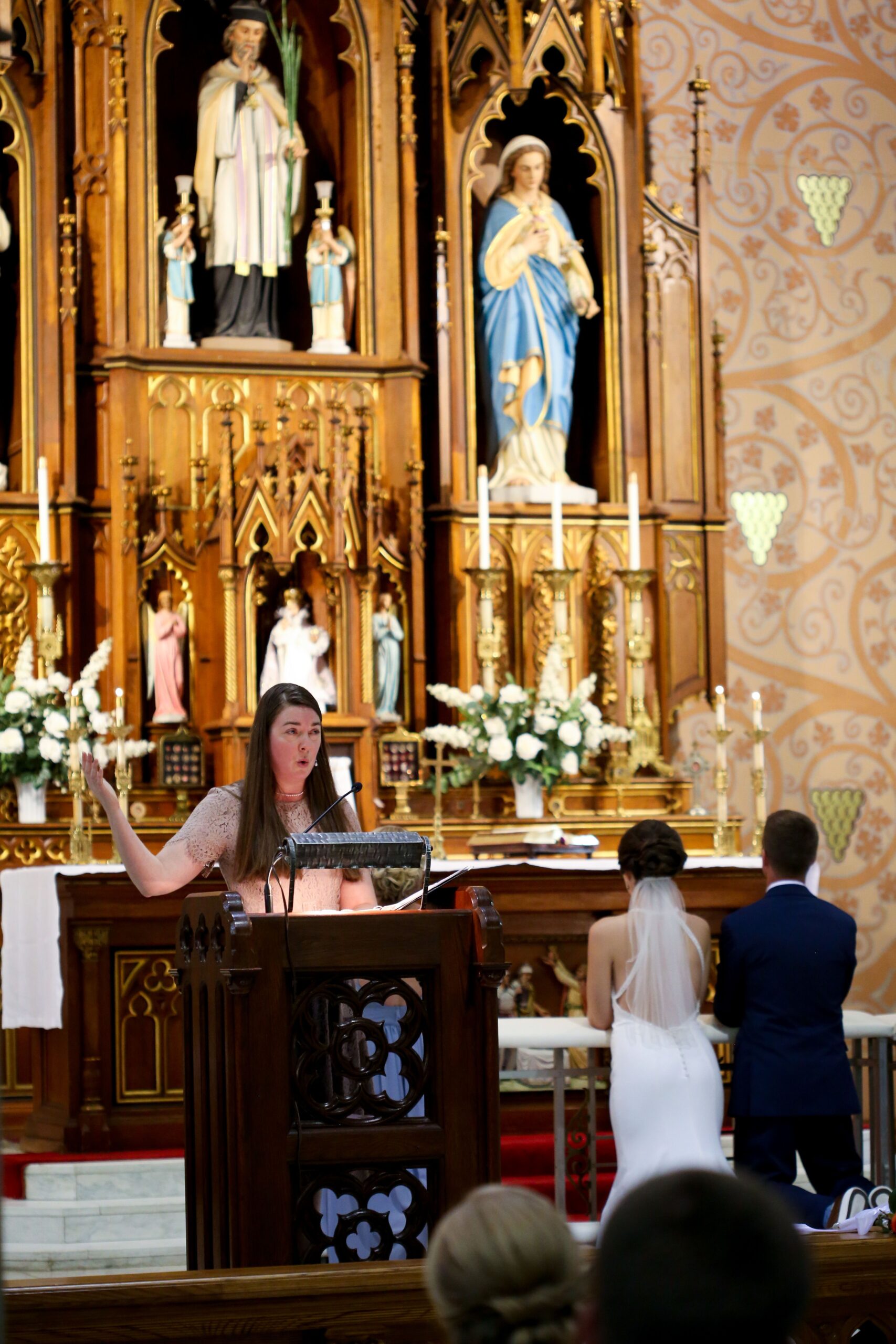 Musician, Angela Marie Rocchio singing at a Catholic Wedding Mass