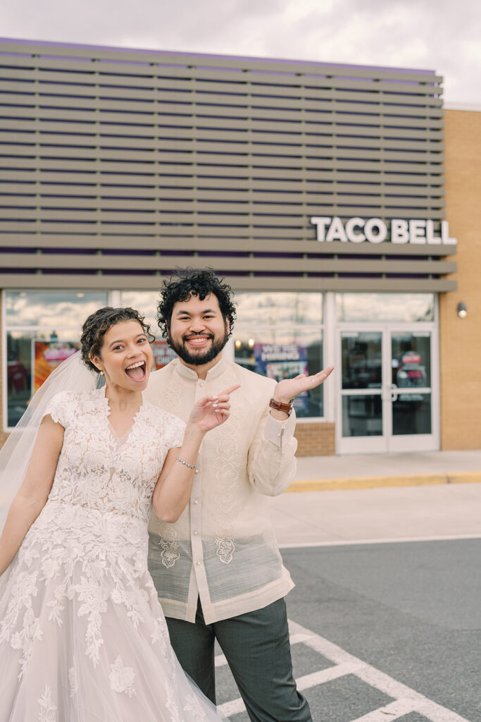 Catholic bride and groom outside Taco Bell