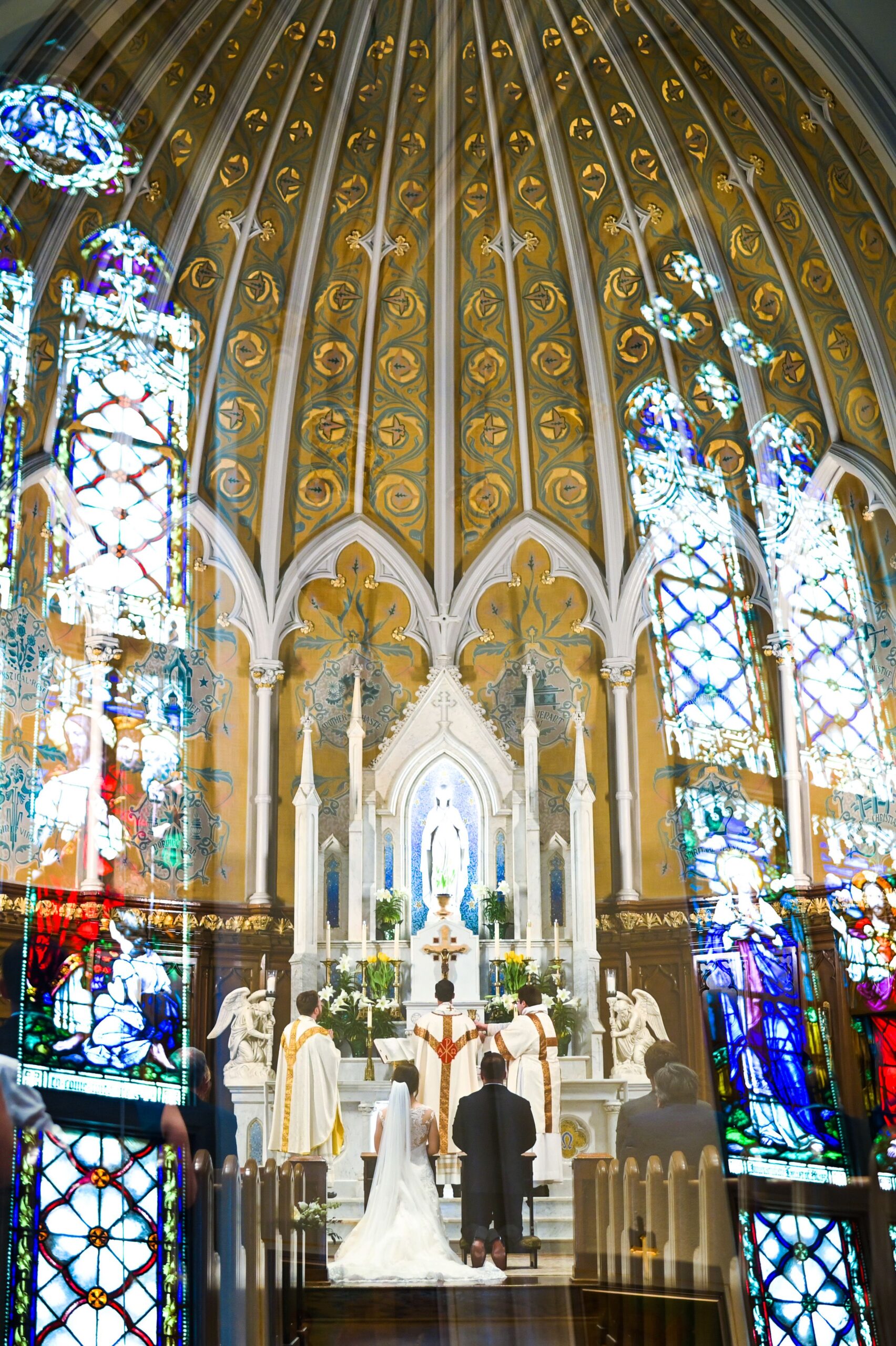 A couple exchanging their own wedding vows in a church